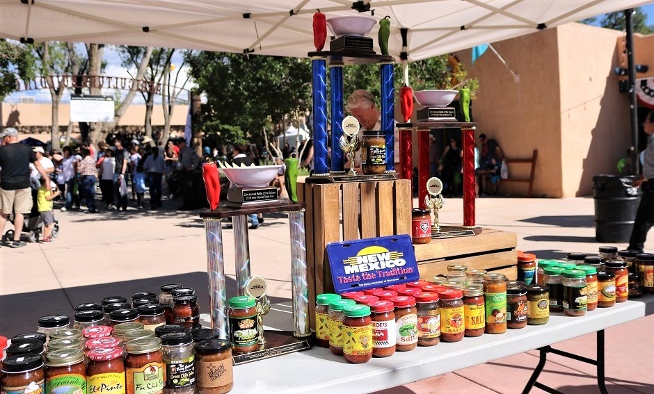 battle of the Salsas Trophies surrounded by different New Mexico salsas