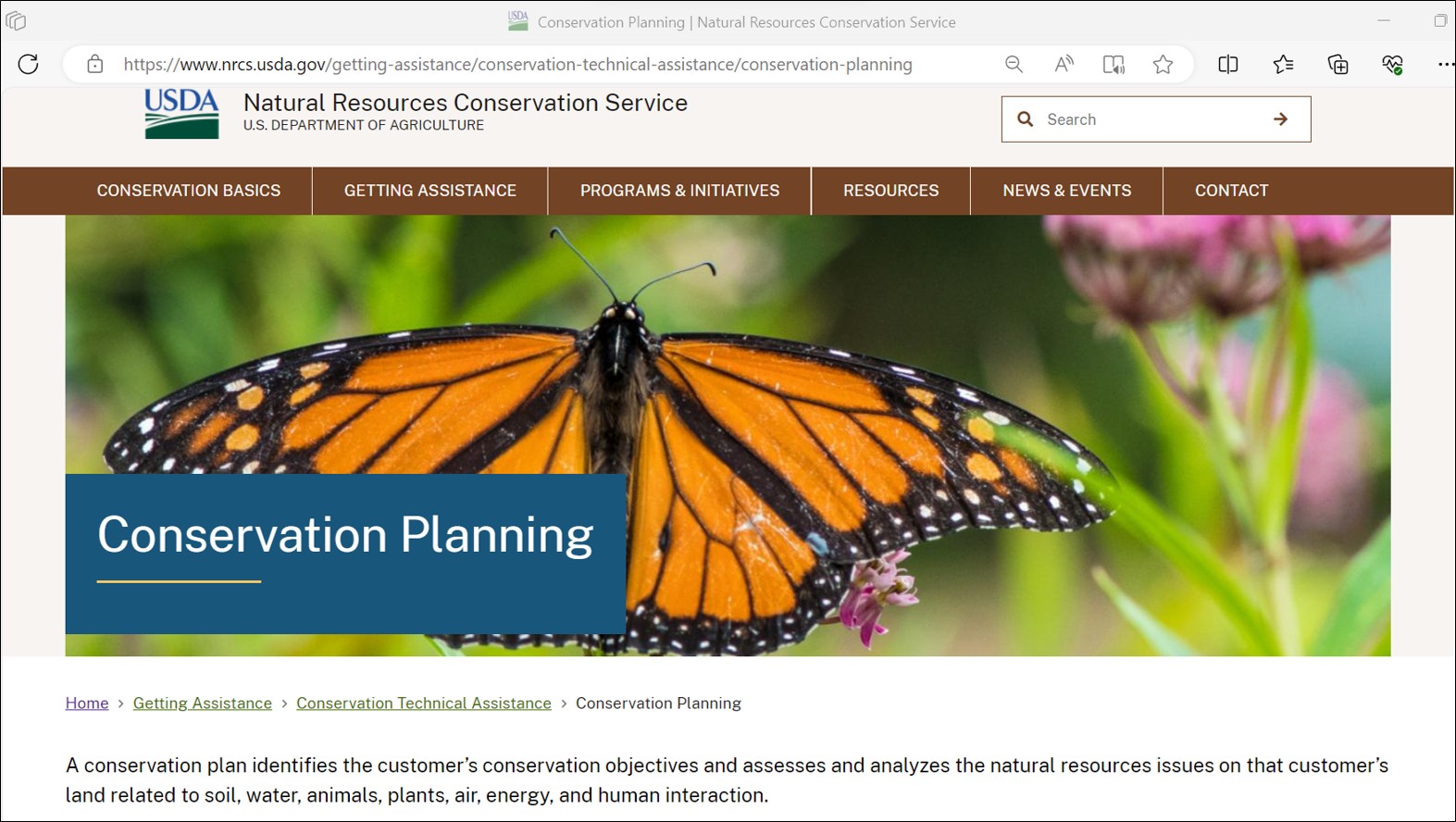 orange butterfly on the banner of the natural resources conservation service website.