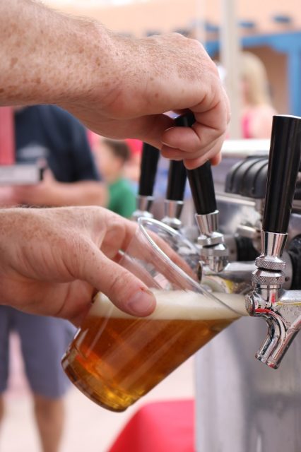 A New Mexico beer being poured into a glass.