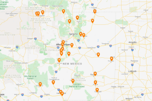 clickable map that has orange dots indicating locations of livetock slaughtering processors in new mexico.